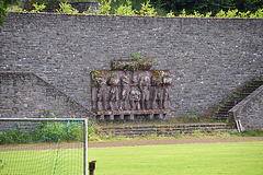 Vogelsang IP – Group statue next to the sportsfield