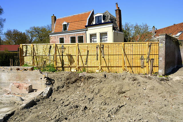 Demolition of the Van der Klaauw Laboratory – Trees caught in a fence