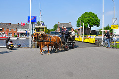 Horse-drawn carriage drives off the ferry
