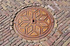 Manhole cover on the Binnenhof in The Hague
