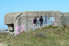 Two boys admiring a bunker