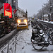 Snow plough clearing the bicycle path