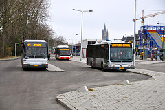 Three buses at Delft station