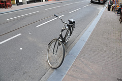 Bicycle parked on the street in the Utrechtsestraat
