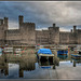 Caernarfon Castle with boats & reflections