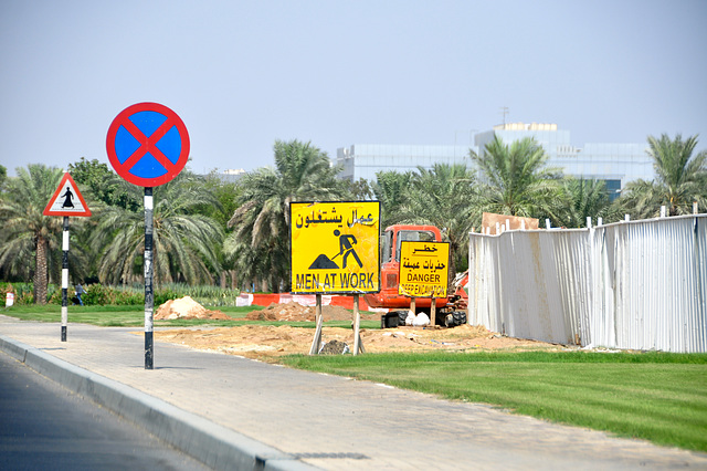 Dubai 2012 – Men at work and warning for men walking away