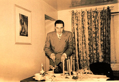 Somebody alert Norman Rockwell.  Dad carves the roast beast, Salt Lake City, Xmas, 1946