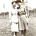 Mom and her friend, Marie, in front of a guard tower at the Border Patrol POW camp near New Orleans, c. 1943