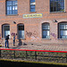 Cleaning graffiti from the Bloemendaal station building