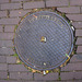 Manhole cover of C.J. van den Broek of Haarlem