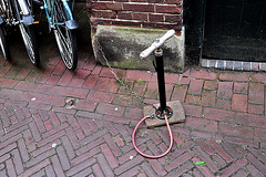 Bicycle pump on a chain