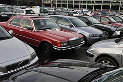 Red Mercedes in a sea of grey cars