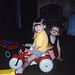 Kristin and Alex tricycle and red wagon.BMP
