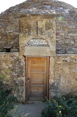 Cistern door and inscription