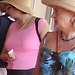 Ultra mature blonde hatter in high heeled sandals / Dame élégante à chapeau du bel âge en sandales à talons hauts.