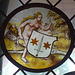 Nude Woman Supporting a Heraldic Shield Stained Glass Roundel in the Cloisters, June 2011