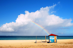 Rainbow and beach hut in Aruba
