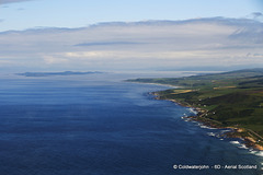 Aerial - West Coast Scotland - the coast north of Machrihanish, with Gigha Island in the distance