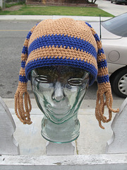 Crocheted hat with stripes and tentacles