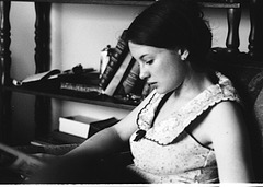 Young woman and bookshelf, 1972