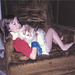 Emily and one of our cats. 1986