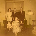 Christmas, 1949. Doris, Rudy, Carl, seated on the davenport (and that's a word you don't hear anymore): Joanne, Karen, Great Grandma Grossenbach, Ricky