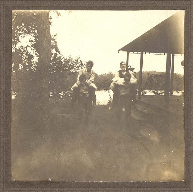 Summer gambol c. 1904. My grandfather and his cousins entertain themselves at the lake cottage racing piggyback.