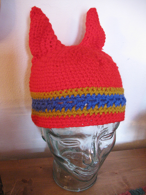 Crocheted red hat with horns