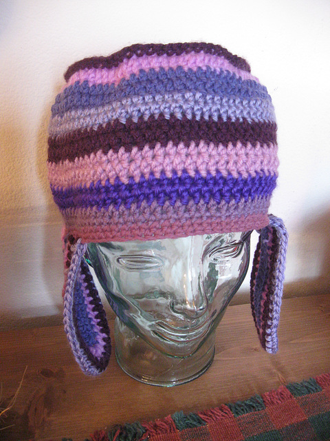 Crocheted striped hat with earflaps
