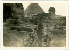 Bicyclist Near the Sphinx and Great Pyramid, Giza Necropolis, Cairo, Egypt