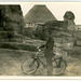 Bicyclist Near the Sphinx and Great Pyramid, Giza Necropolis, Cairo, Egypt
