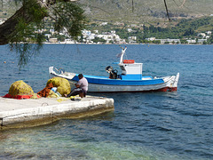 Alinda- Fisherman, Nets and Boat