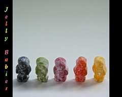 Five little Jelly Babies standing in a row