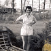 The '50s. Mom, c. 1958. First warm days of spring in the back yard.
