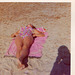 My mum horizontal on the beach