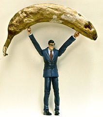 A Mild Mannered Reporter for a Large Metropolitan Newspaper Holding Up the World's Largest and Ugliest Banana