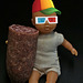 Young Boy with Salami Wearing Propellar Beanie and 3D Glasses