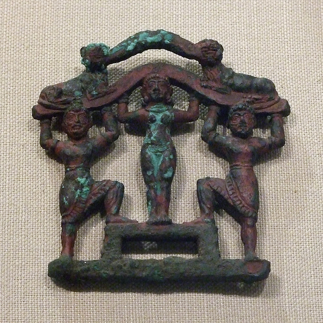 Plaque with a Nude Female Between Two Bearded Men in Kilts in the Metropolitan Museum of Art, July 2010