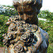 Detail of the Bronze Sculpture of a Girl Holding a Sundial in the Rose Garden in the Brooklyn Botanic Garden, July 2008