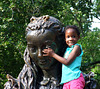 Girl Posing with the Alice in Wonderland Sculpture in Central Park, May 2011