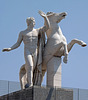 Sculpture of one of the Dioscuri in front of the Palazzo Della Civilta Italiana in EUR in Rome, July 2012