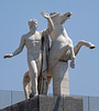 Sculpture of one of the Dioscuri in front of the Palazzo Della Civilta Italiana in EUR in Rome, July 2012