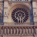 Rose Window and Sculptural Facade Detail of Notre Dame in Paris, March 2004