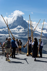 Alphorn Players in front of the Matterhorn