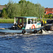 Push boat Wust on the river Zijl