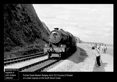 Former Great Western Railway 4-6-0 1011 County of Chester on a down express on the South Devon coast.