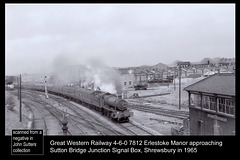 GWR 4-6-0 7812 Erlestoke Manor at Sutton Bridge Junction Signal Box, Shrewsbury, on the down Cambrian Coast Express - 4.8.1965