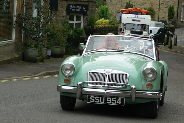 MG in the parade of cars attending the