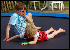 Lina and Torben jumping on the trampoline