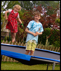 Lina and Torben jumping on the trampoline